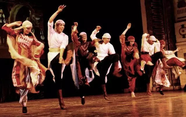 Dabke dancers performing in traditional attire
