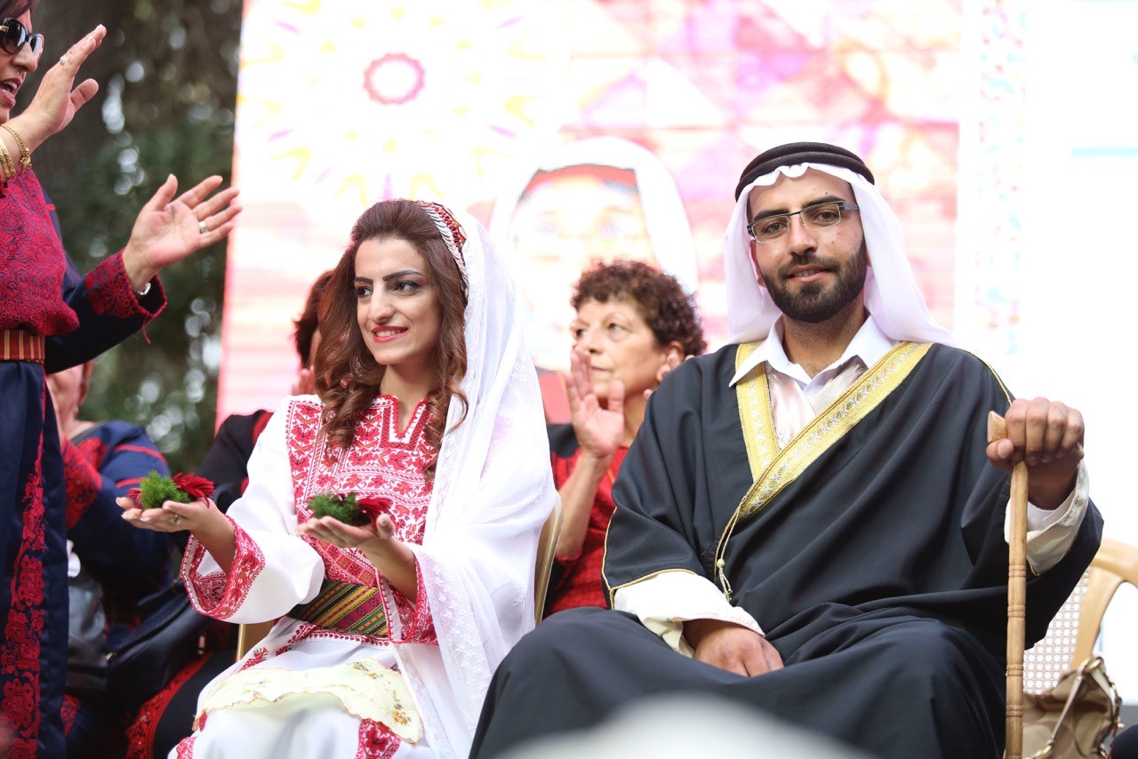 Traditional Palestinian wedding with folk dress and music